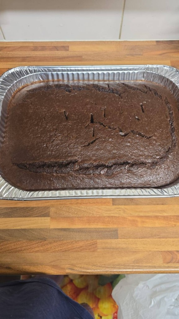 A freshly baked large tray cake